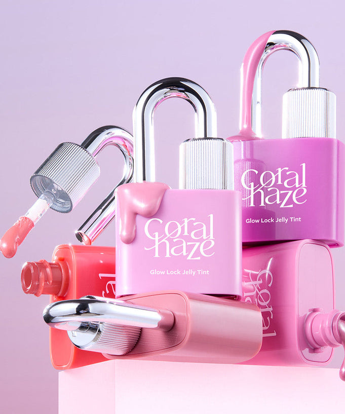 CORALHAZE Glow Lock Jelly Tint in various shades with stylish lock packaging on a pink background.