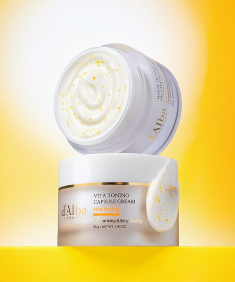 D'ALBA Vita Toning Capsule Cream Complex 55g in open container showcasing rich cream texture against a bright yellow background.