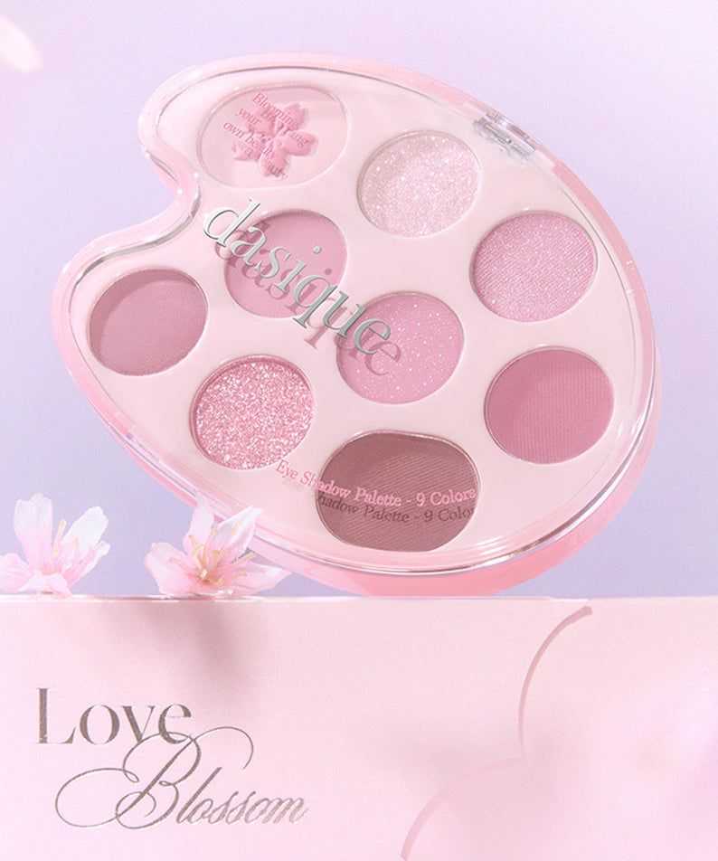 DASIQUE Pink Blossom Shadow Palette featuring 9 dazzling pink shades, displayed elegantly on a floral background.