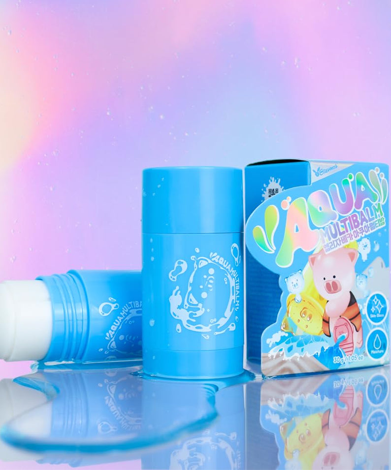 ELIZAVECCA Aqua Multii Balm 30g with colorful packaging displaying piglet cartoon, shows open and closed blue balm stick against pastel background.