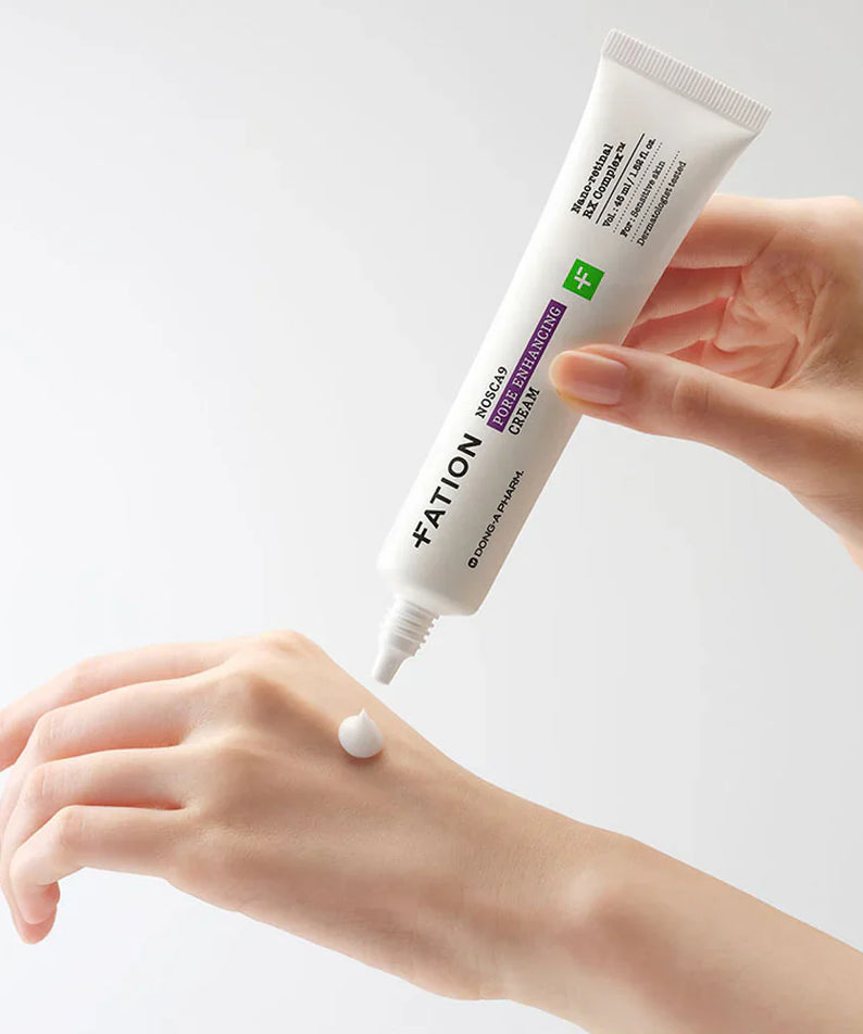 FATION Nosca9 Pore Enhancing Cream 45ml being applied to skin, showing texture and packaging.