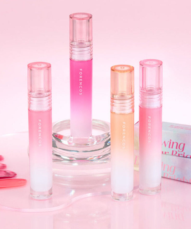 FORENCOS All Light Mood Glow Tint in vibrant packaging with shades displayed on a pink background