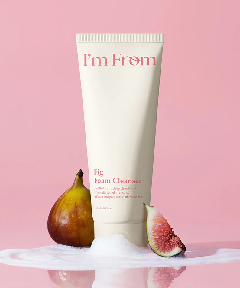 I'M FROM Fig Foam Cleanser 150ml with figs on pink background, showcasing the product's key ingredients and packaging.