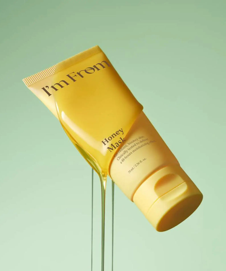 I'M FROM Honey Mask 70ml product image with honey draping over yellow tube against green background