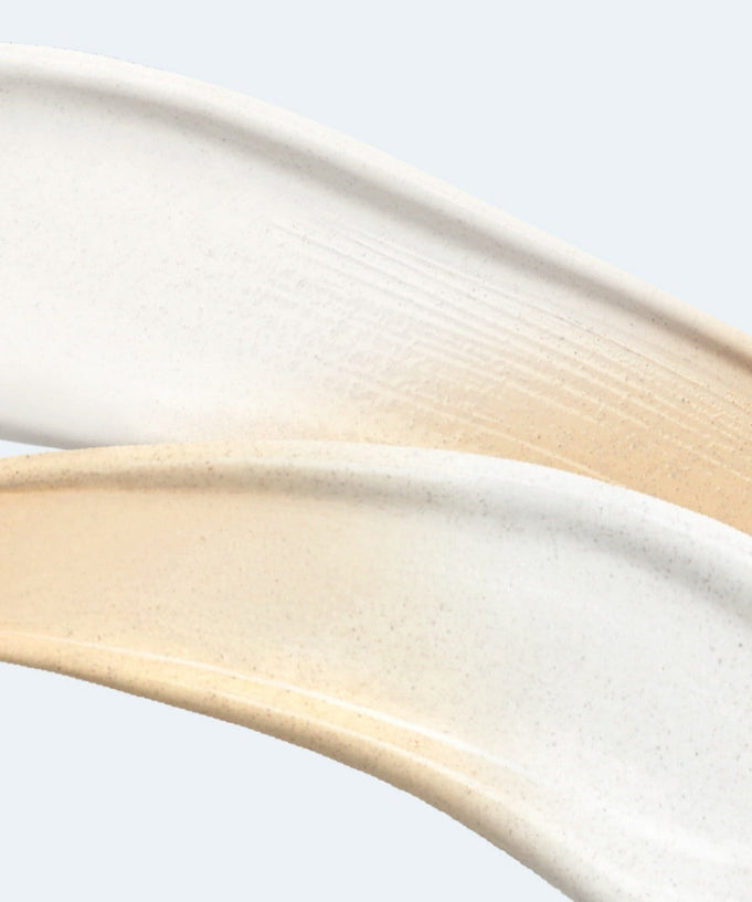 Texture of B.READY True Tone Lotion 2.0 40ml showing smooth cream swatches in ivory and beige.