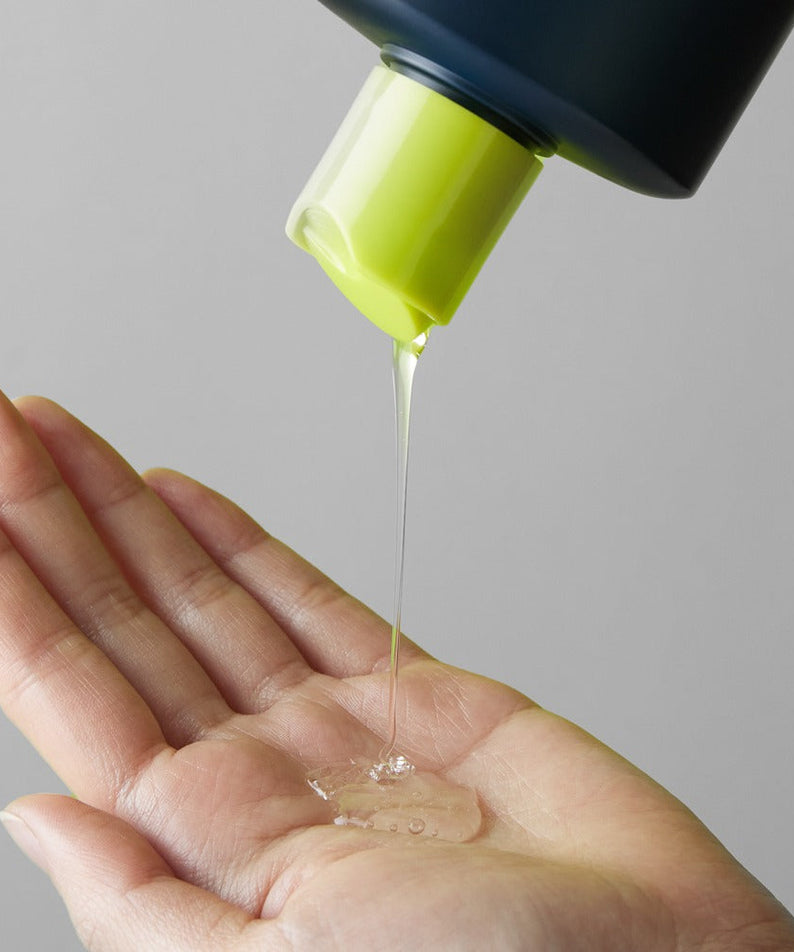 BRTC Homme Active Max Hair & Body All-Round Wash 200ml pouring clear gel into a gentleman's palm — Gentleman Korea skincare for men