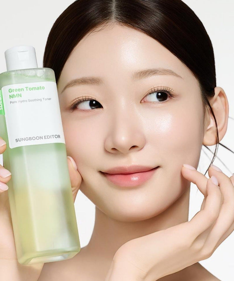 Woman holding SUNGBOON EDITOR Green Tomato NMN Pore Hydro Soothing Toner 350g, showcasing skincare routine.