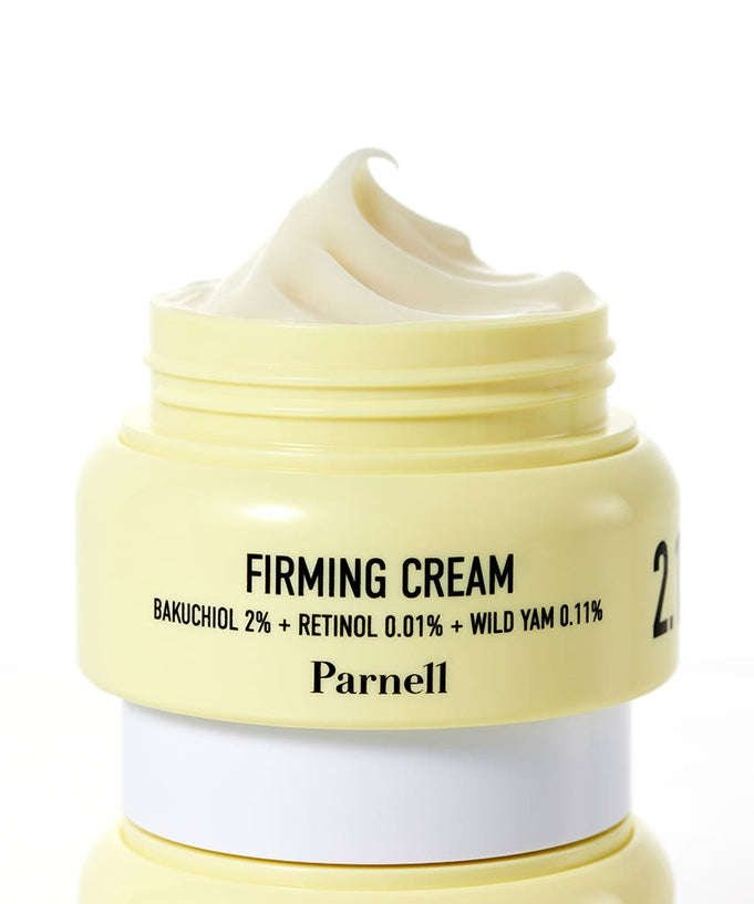 Open jar of PARNELL Firming Cream with ingredients Bakuchiol, Retinol, and Wild Yam for smoother skin.