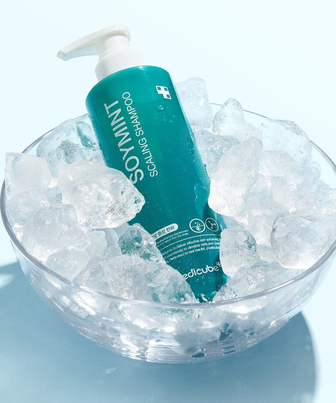 MEDICUBE Soymint Scaling Shampoo 490ml in a bowl of ice, showcasing cool and refreshing design.