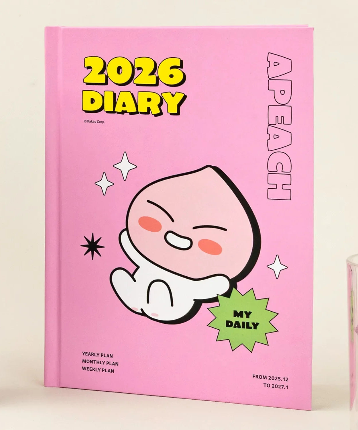 KAKAO FRIENDS Planner 2026 featuring APEACH on a pink cover for organizing yearly, monthly, and weekly plans.