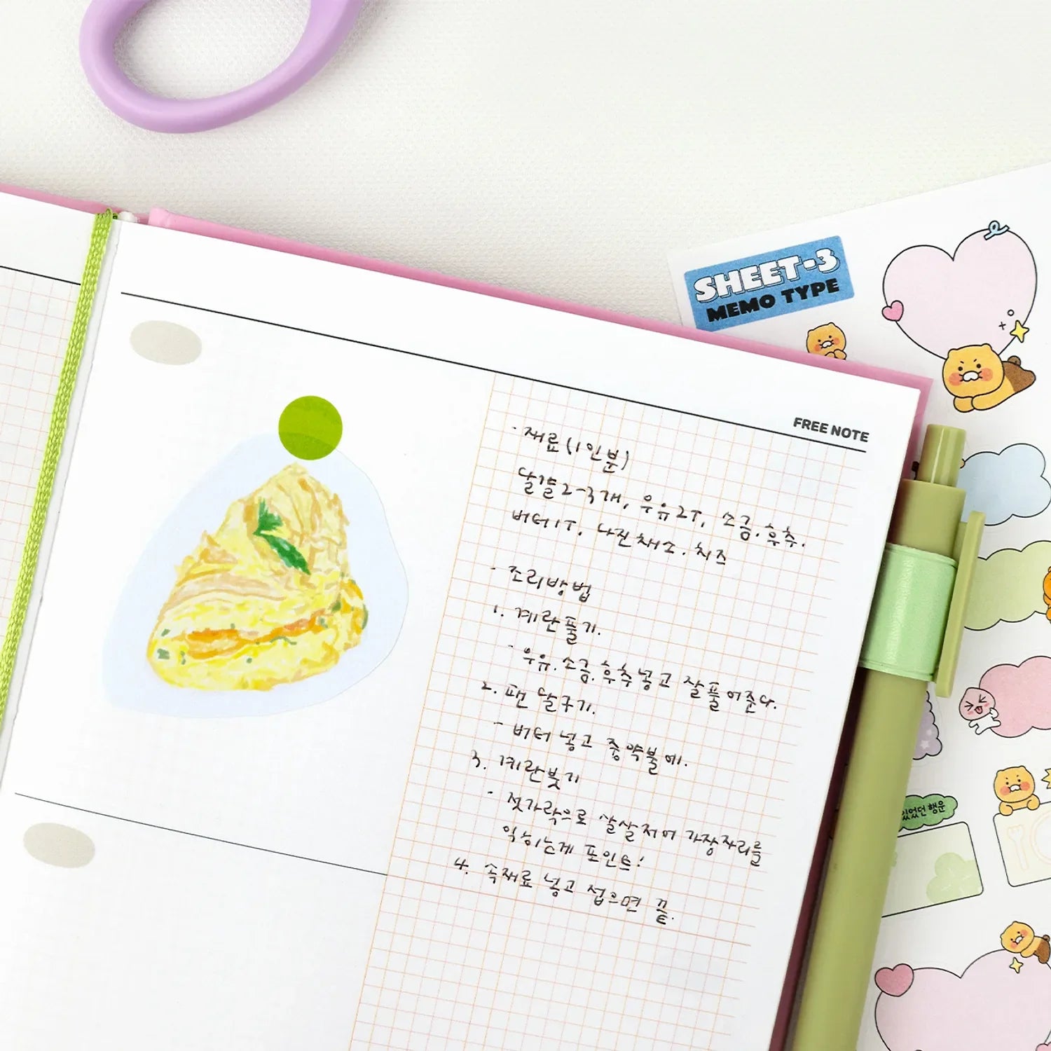Open KAKAO FRIENDS Planner 2026 showing notes, drawing, and colorful stickers. Perfect for organizing and planning in style.
