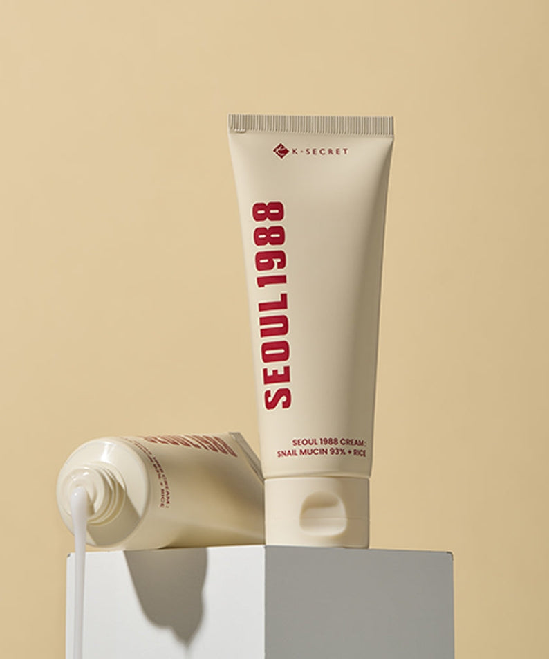 SEOUL 1988 Snail 93 Cream tube on display with minimalist background.