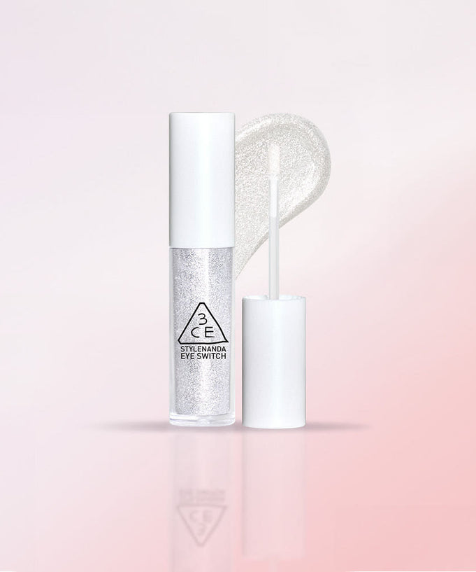 3CE Eye Switch glitter makeup for dazzling eyes on pastel pink background