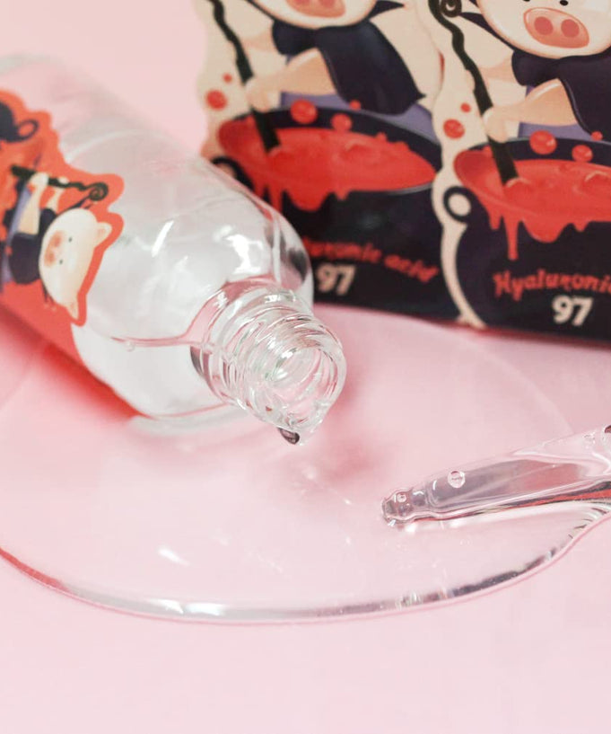 ELIZAVECCA Witch Piggy Hell-Pore Control Hyaluronic Aid 97 50ml serum bottle with liquid and box in the background