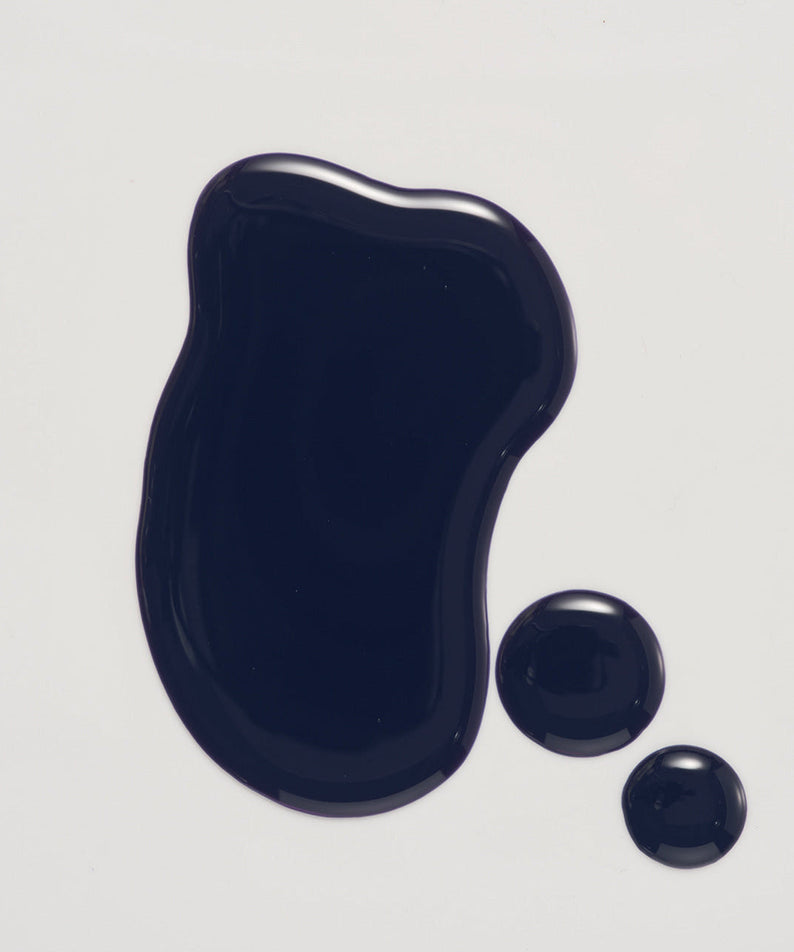 Texture of LADOR Anti-Yellow Complement Tary Shampoo 300ml showing rich dark liquid consistency.