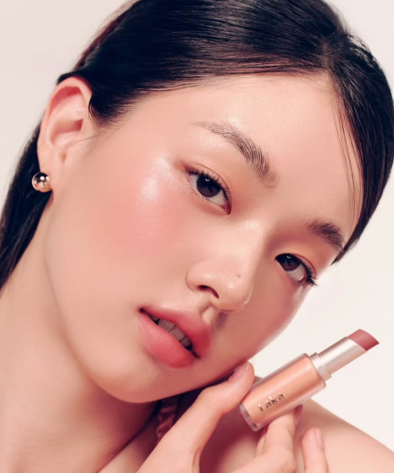 Model showcasing LAKA Bulky Matte Lipstick with a close-up view emphasizing the lip color.