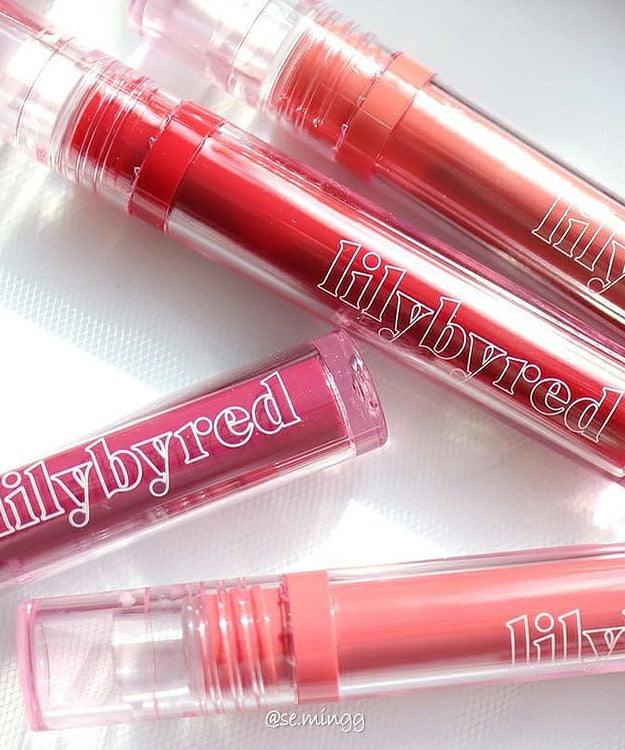 LILYBYRED Glassy Layer Fixing Tint with vibrant colors in sleek packaging, perfect for long-lasting lip color.