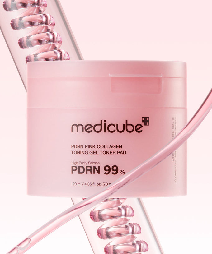 MEDICUBE PDRN Pink Collagen Toning Gel Toner Pad 70pads in pink packaging on artistic background