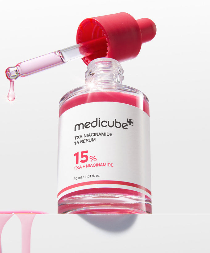 MEDICUBE TXA Trace Toning Serum 30ml with dropper, featuring niacinamide 15% for effective skin toning and brightening.