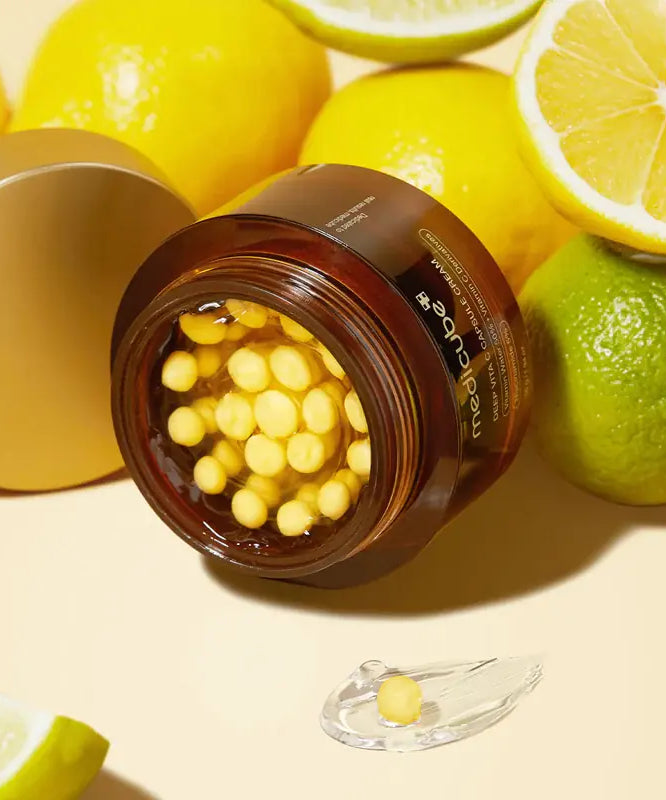 MEDICUBE Deep Vita C Capsule Cream 55g with citrus fruits, showing open jar and yellow capsules for brightening and skincare benefits.