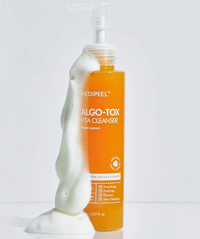 MEDIPEEL Algo Tox Vita Cleanser 150ml bottle with foamy texture, skincare product for deep cleansing and hydration.