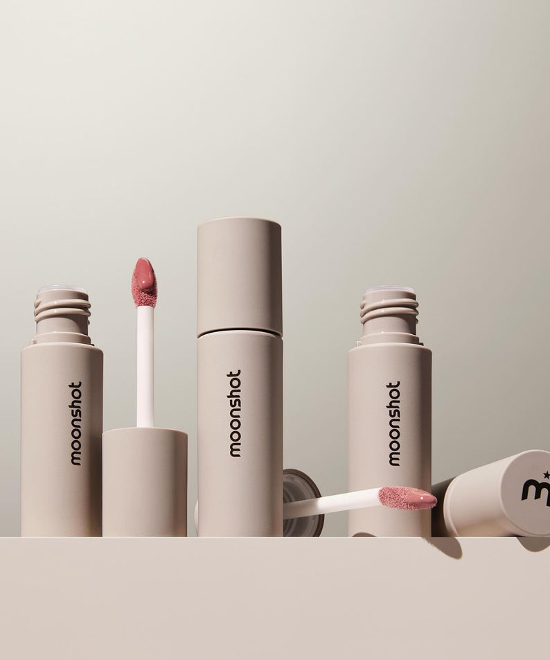 MOONSHOT Conscious Fit Melow Lip Tint in various shades on display