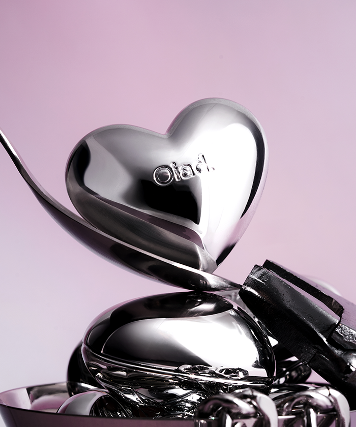 OIAD Silverpulse Moussecream Lip&Cheek product with heart-shaped silver design, concept photo.