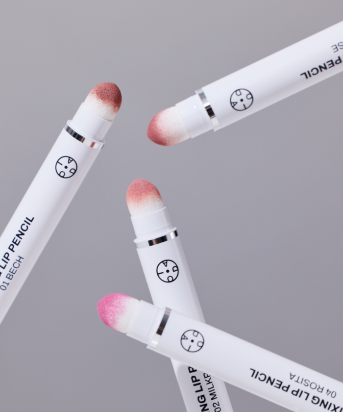 OIAD Blur Fixing Lip Pencil with soft applicators in a dynamic arrangement