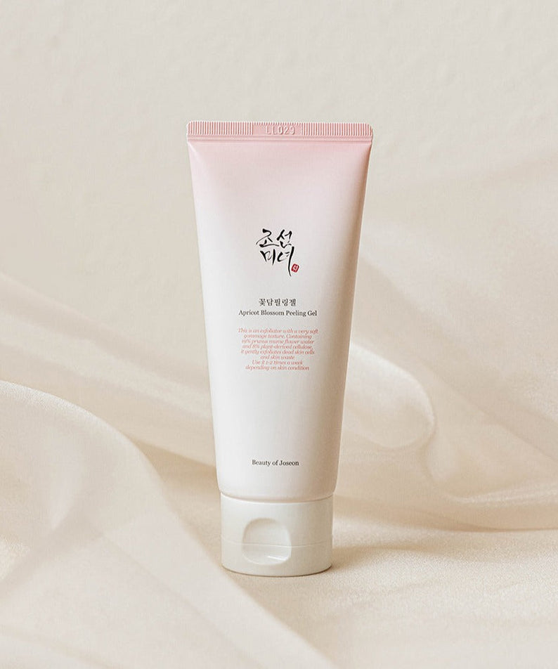 BEAUTY OF JOSEON Apricot Blossom Peeling Gel 100ml tube on soft fabric background