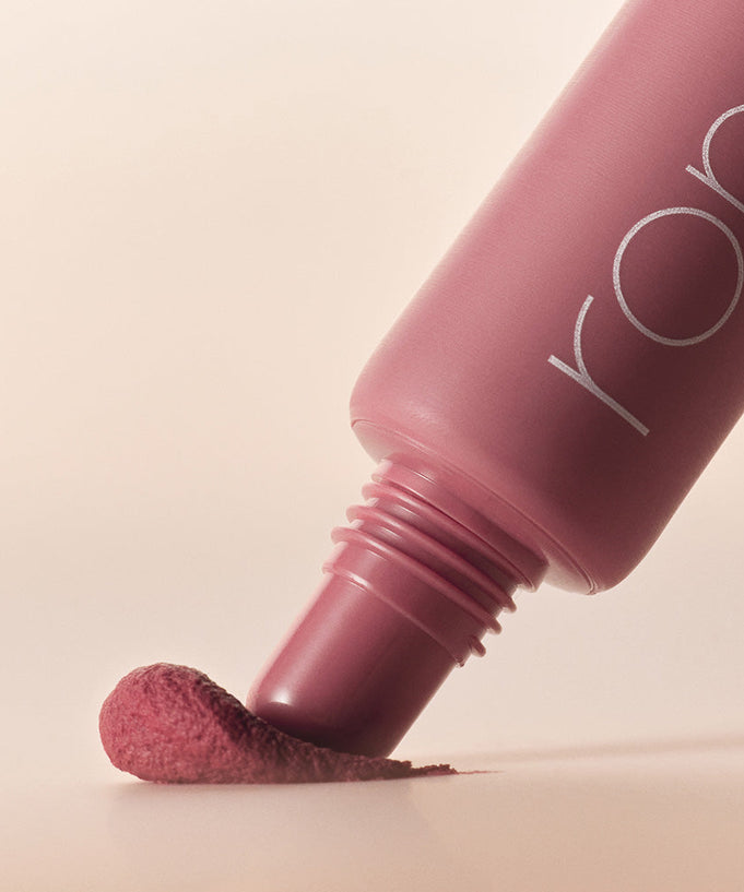 ROMAND Color Lip Matte in a sleek pink tube with color swatch, showcasing vibrant matte finish.