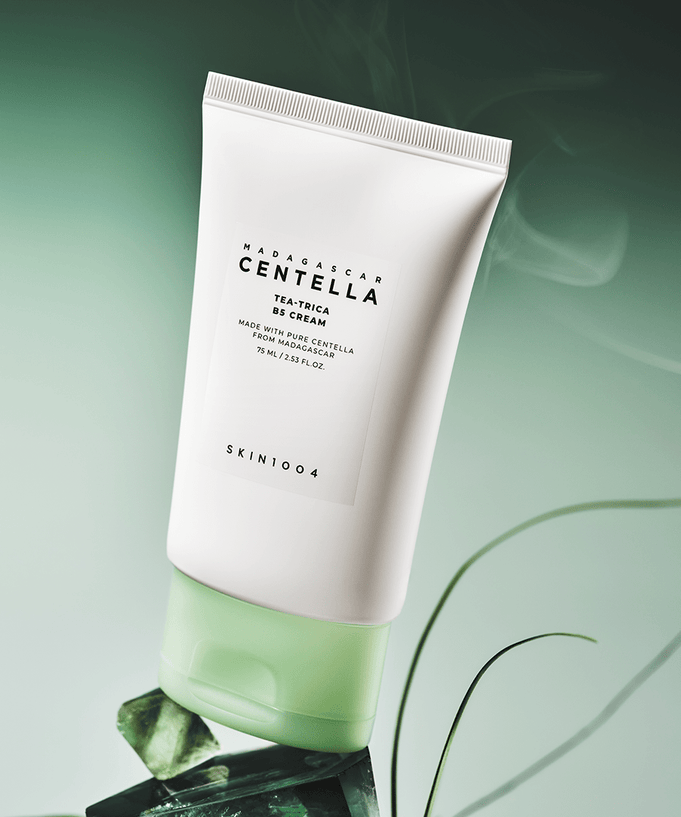 SKIN1004 Madagascar Centella Tea-trica B5 Cream 75ml on a green background with leaves