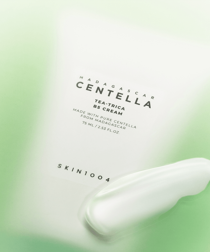 SKIN1004 Madagascar Centella Tea-trica B5 Cream 75ml tube on a green background