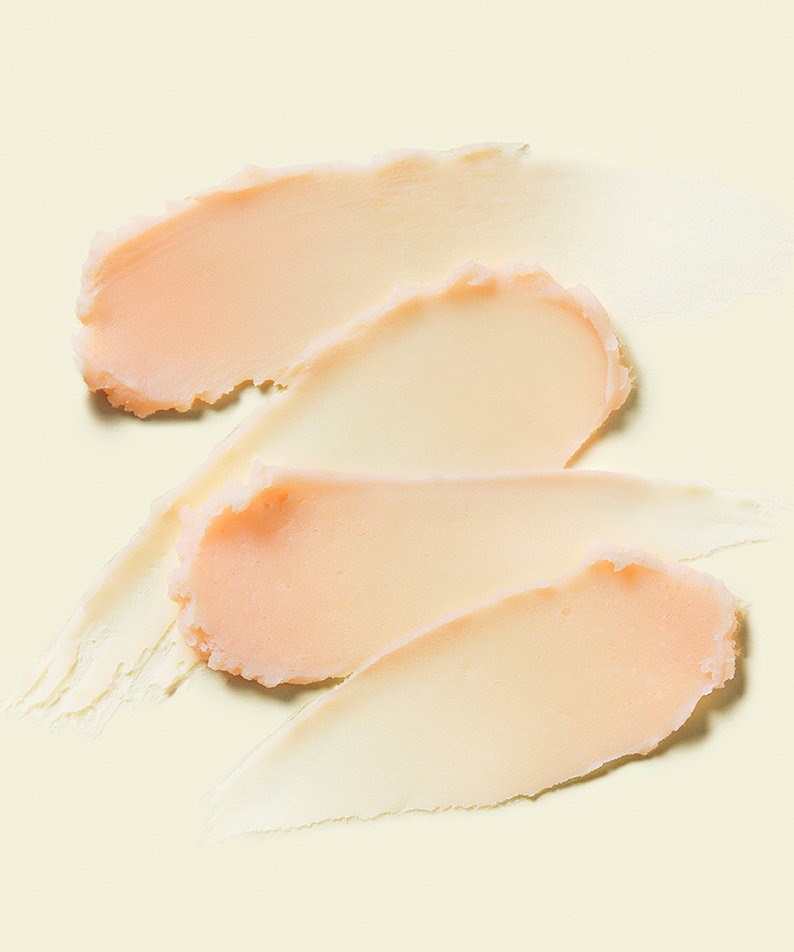 Texture of TOCOBO Vita Airy Sun Primer 35ml swatches in creamy shades, showcasing product consistency and finish.