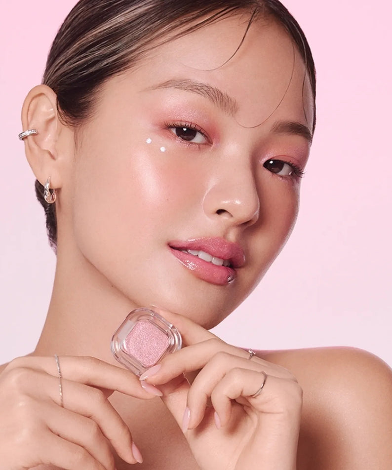 Model wearing TONY MOLY Eyetone Single Eyeshadow in pastel pink shade, showcasing vibrant makeup look.