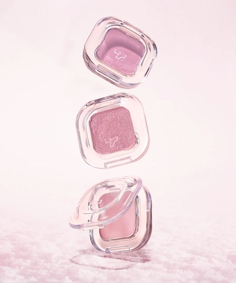 TONY MOLY Eyetone Single Eyeshadow in pink shades with a luxurious, glittery finish, perfect for elegant eye makeup looks.