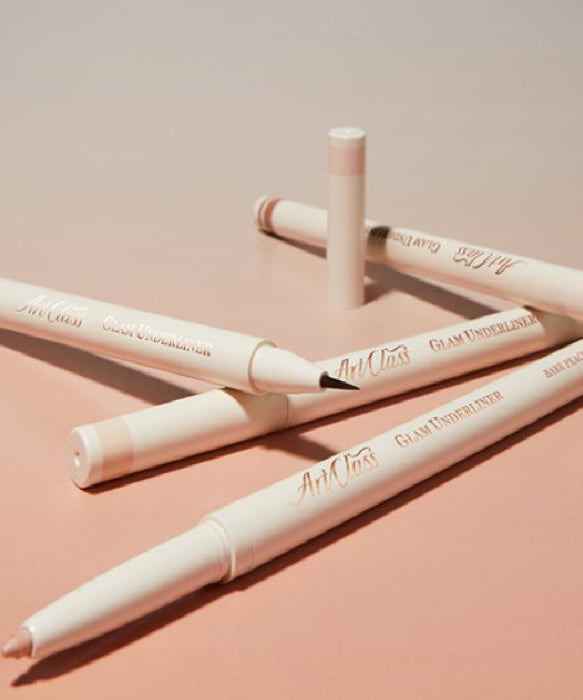 TOO COOL FOR SCHOOL Glam Under Liner on a pastel background showcasing beauty eyeliner pens.